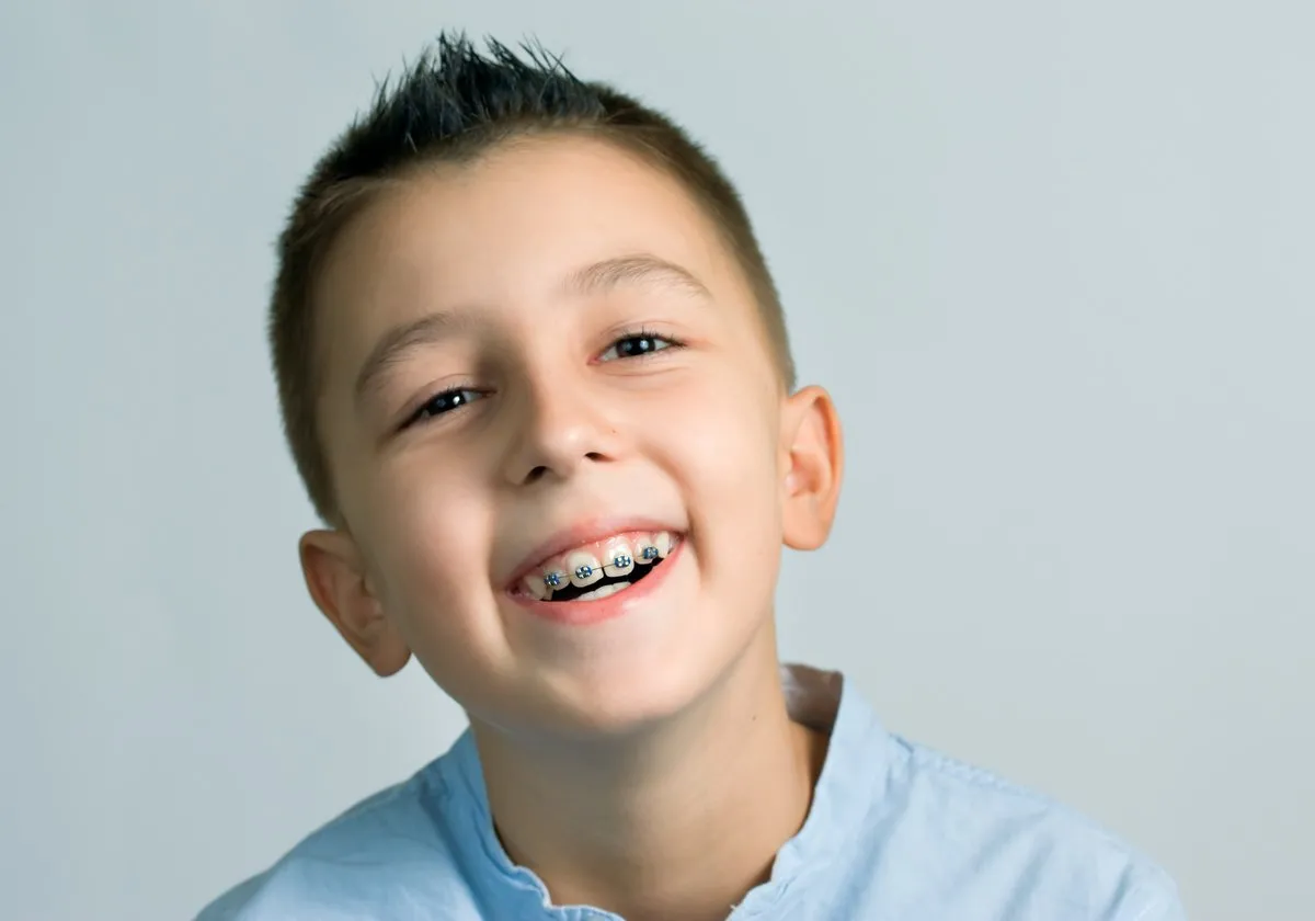 Smiling boy with braces